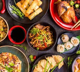 an assortment of Chinese dishes
