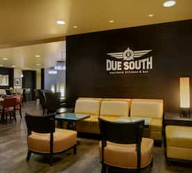 seating area with Due South on wall