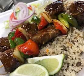 skewers of meat with rice