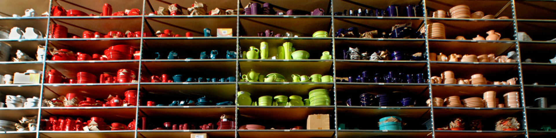 shelf of colorful ceramics