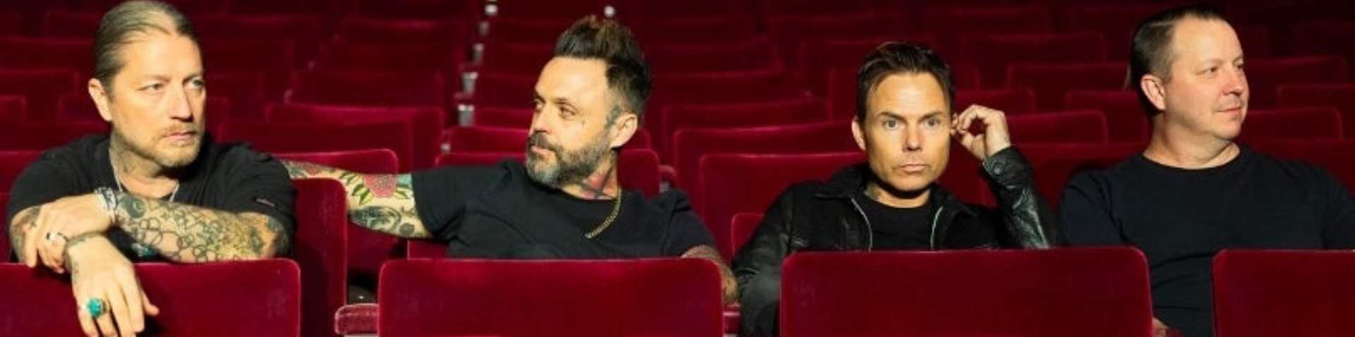 Blue October sitting in theatre seats