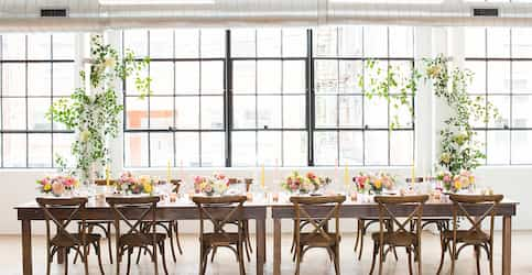 table set up for event in front of large window