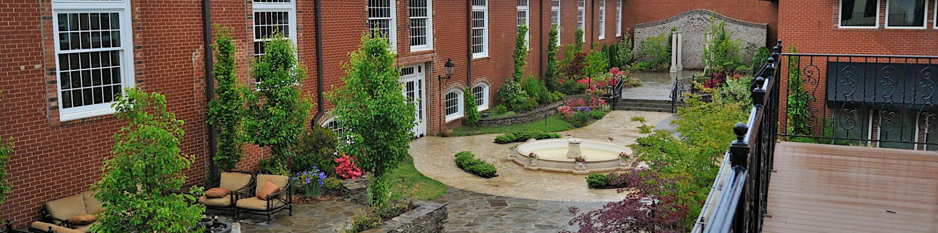 outdoor space between brick buildings