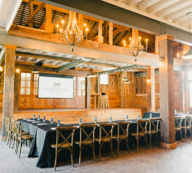 barn interior with table and projector