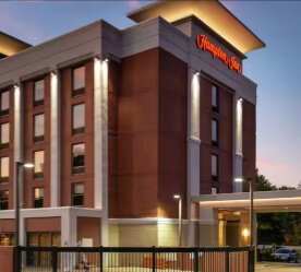 airport hotel exterior at dusk