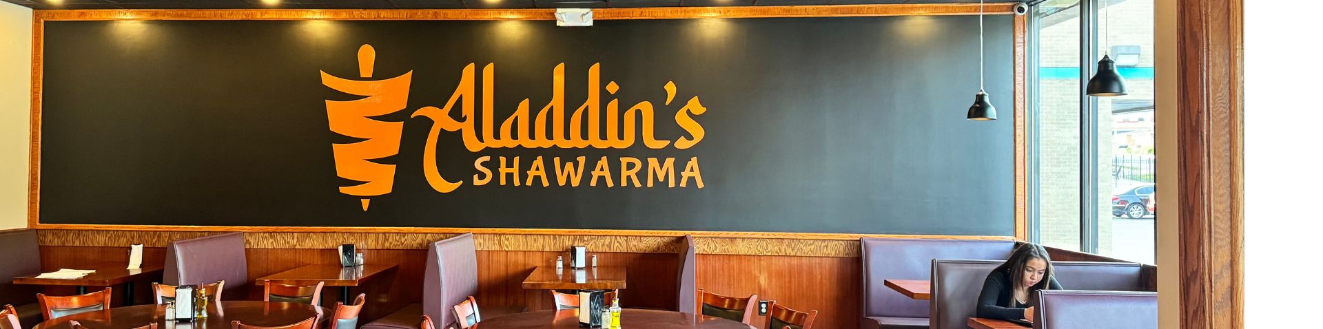 wall decor with name of Arabic restaurant 