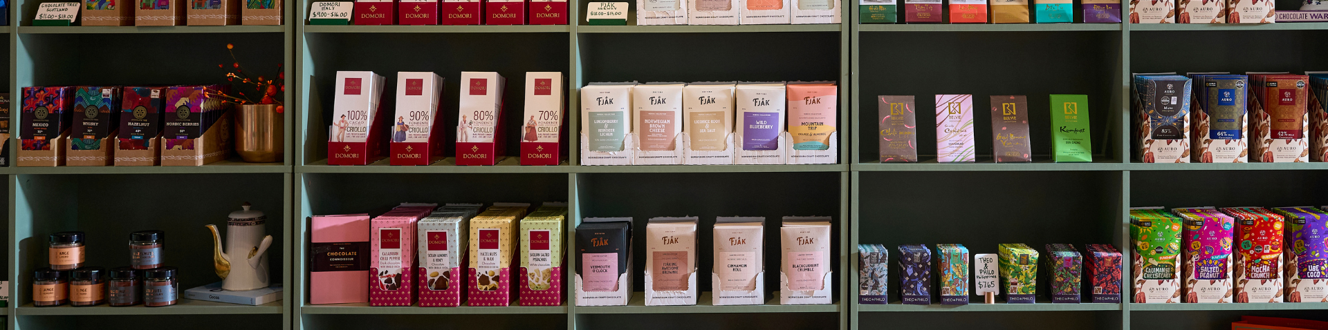 close-up of shelves of chocolate and tea selections
