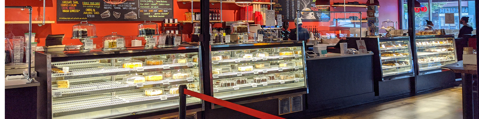 close-up of cheesecakes display counter and menu
