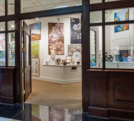 looking into the art gallery from the hotel lobby