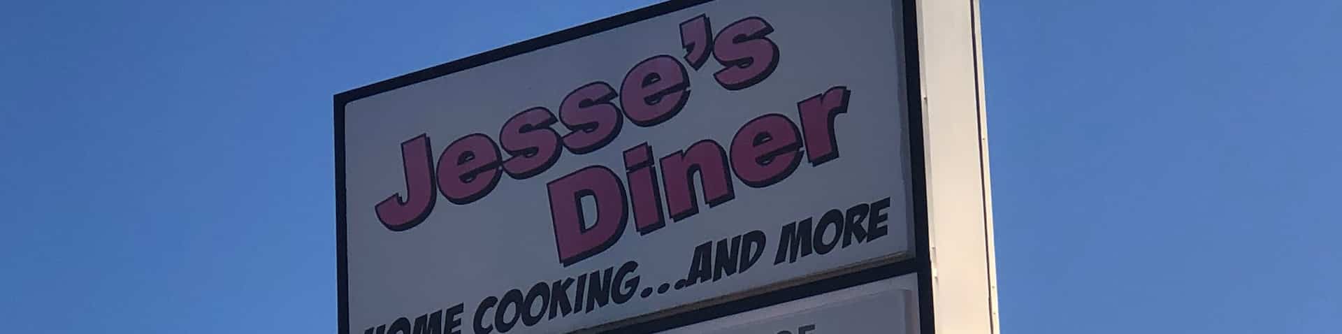 sign in front of restaurant