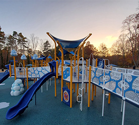 playground with pretty sunset behind it