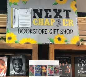 bookstore sign above check-out counter