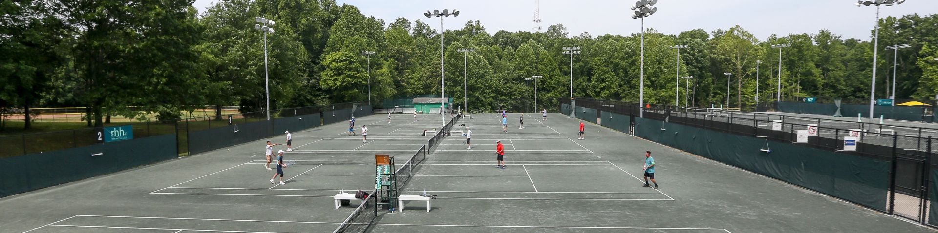 Families playing tennis