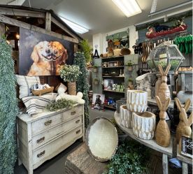 close-up of paintings and other items sold at the shop