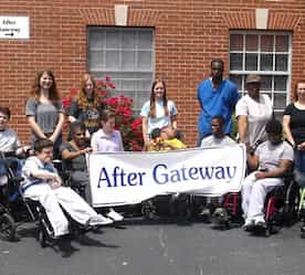 staff holding sign