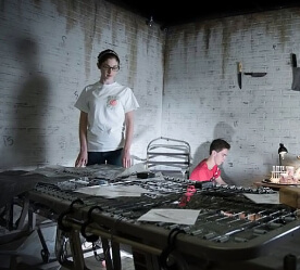 3 people trying to solve the breakout room