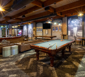 lounge area with a pool table