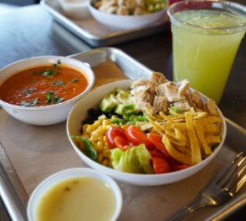 soup and salad with a drink