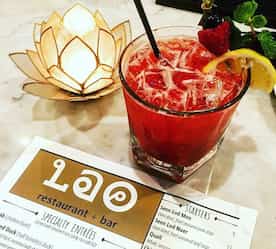 a drink with menu in picture and table decoration