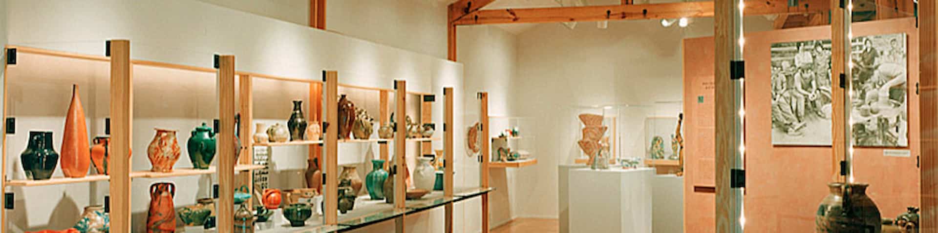 a view of inside of pottery center with pottery displayed
