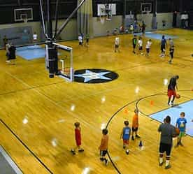 kids playing on basketball court