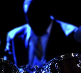 blue and black drummer