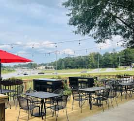 outdoor seating area with accent lighting