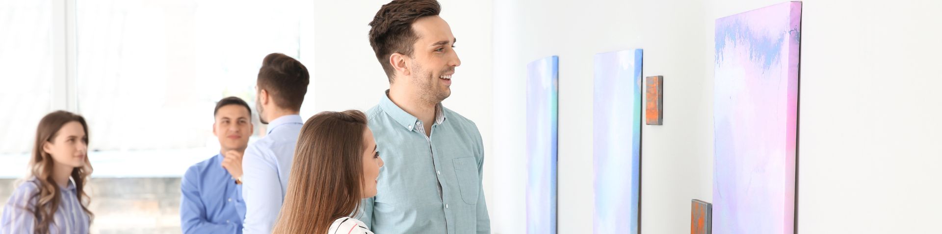 friends enjoying looking at art together